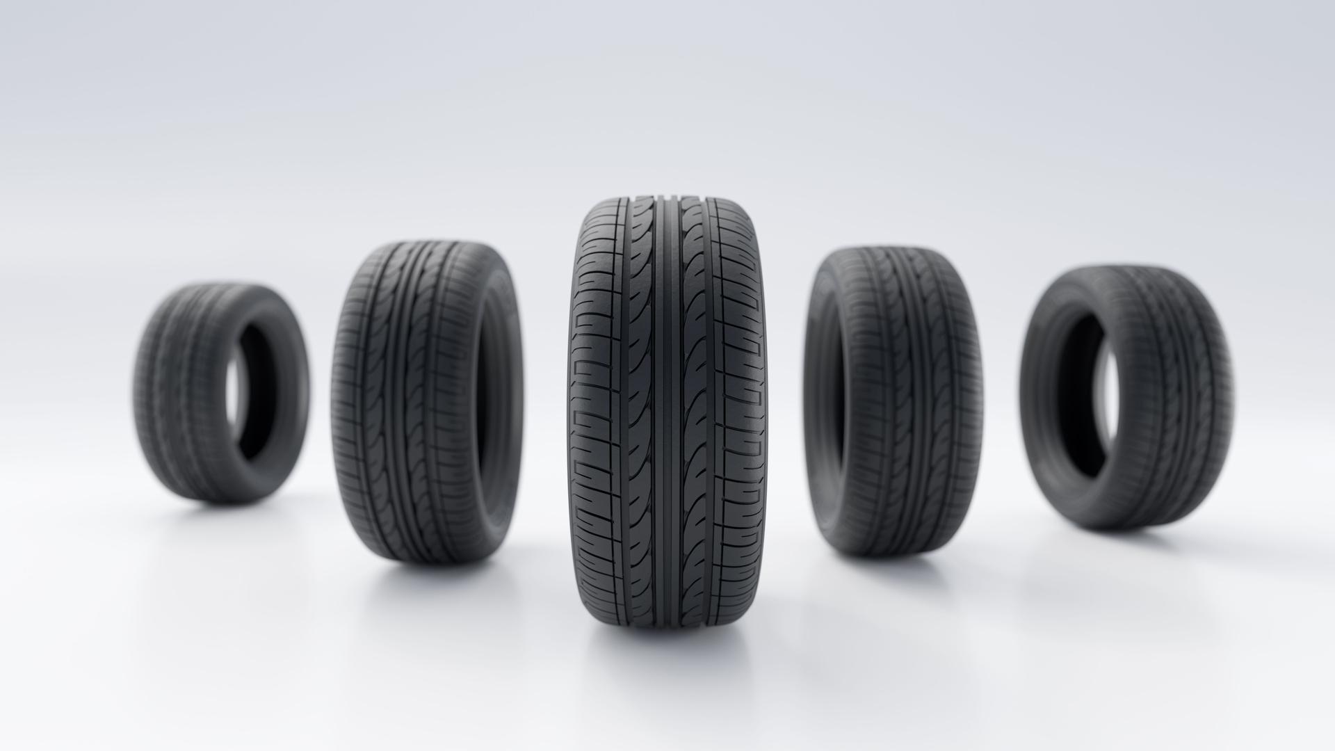 High-Quality Tires in a Row on a Minimal Background